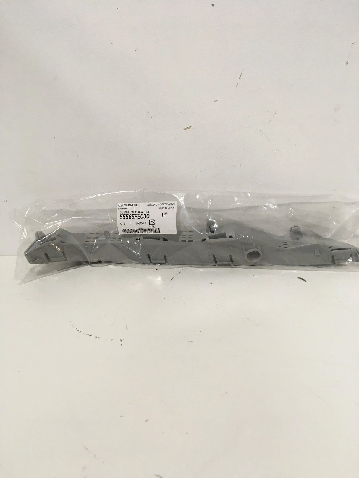 55565FE030 Subaru Wing Bracket Slide Mount L/H