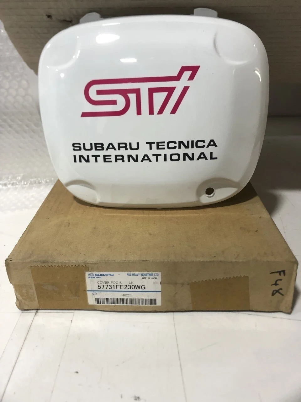 57731FE230WG Subaru Fog Light Cover L/H WRX