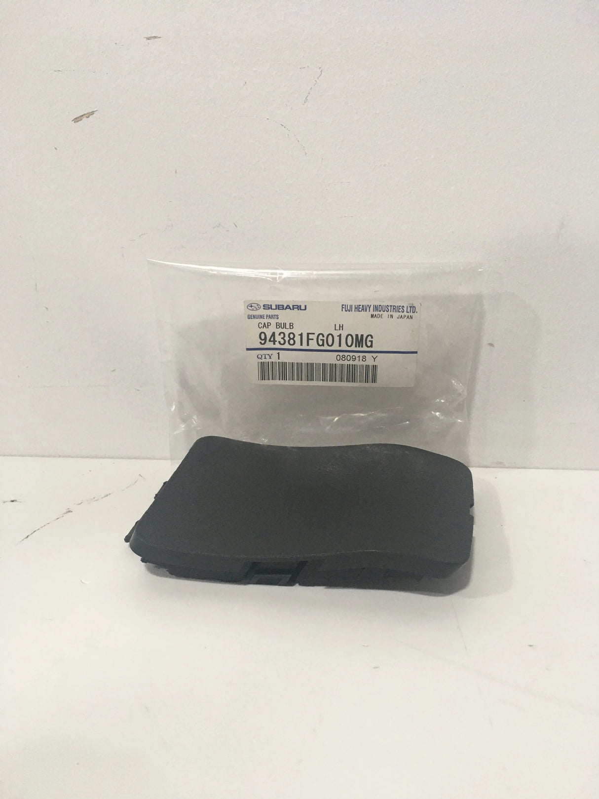 94381FG010MG Subaru Light Bulb Cover Trim L/H