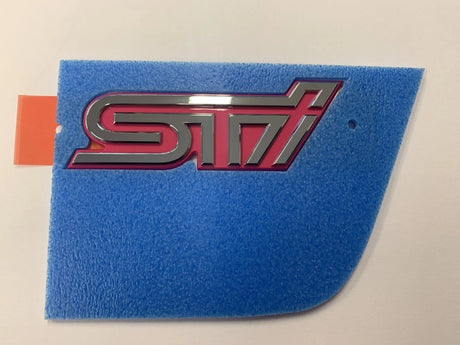 93073FE580 Subaru Pink STI Boot Badge 2004