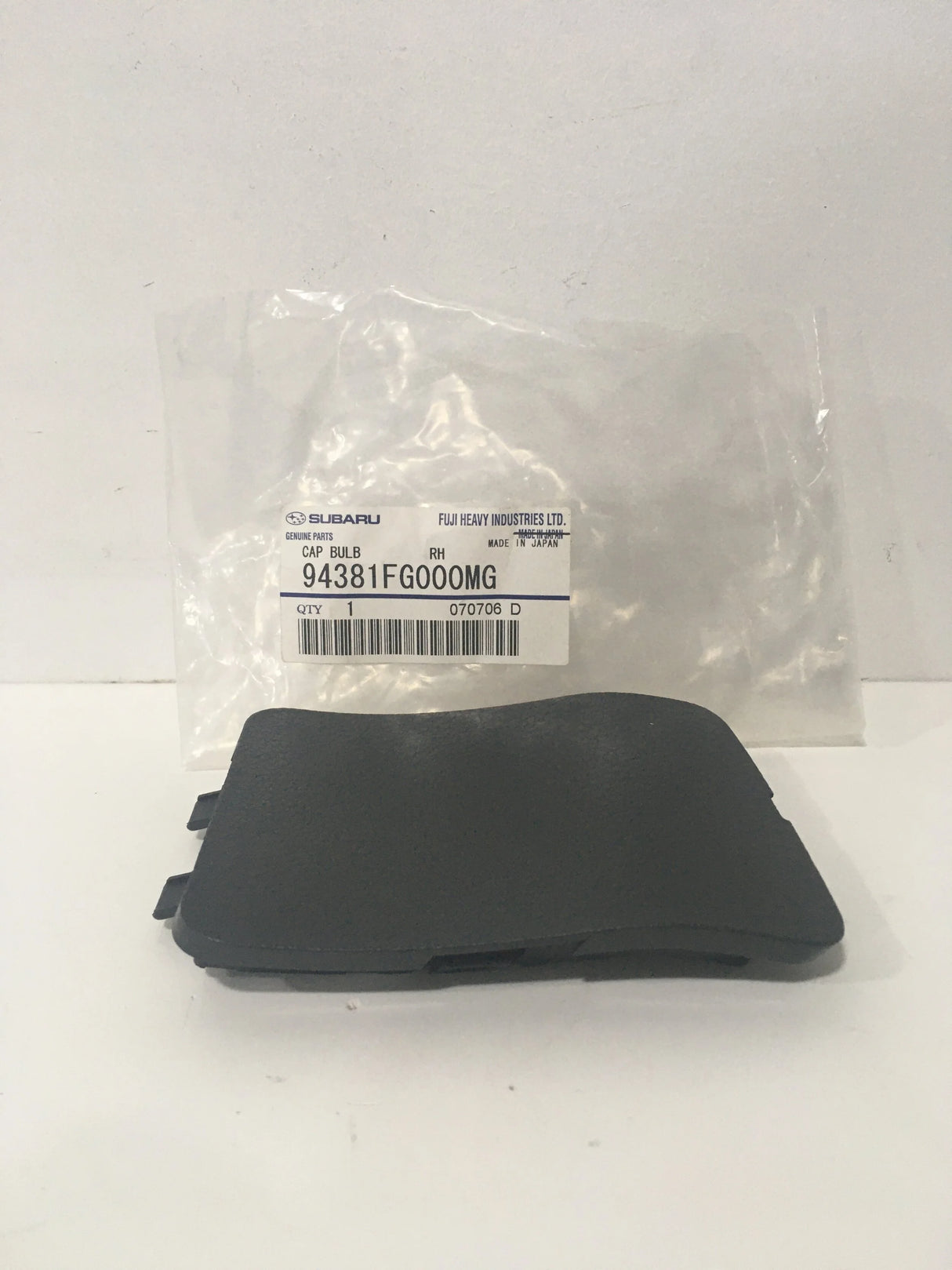 94381FG000MG Subaru Light Bulb Cover Trim R/H